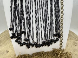 Collier en Onyx Noir Rideaux